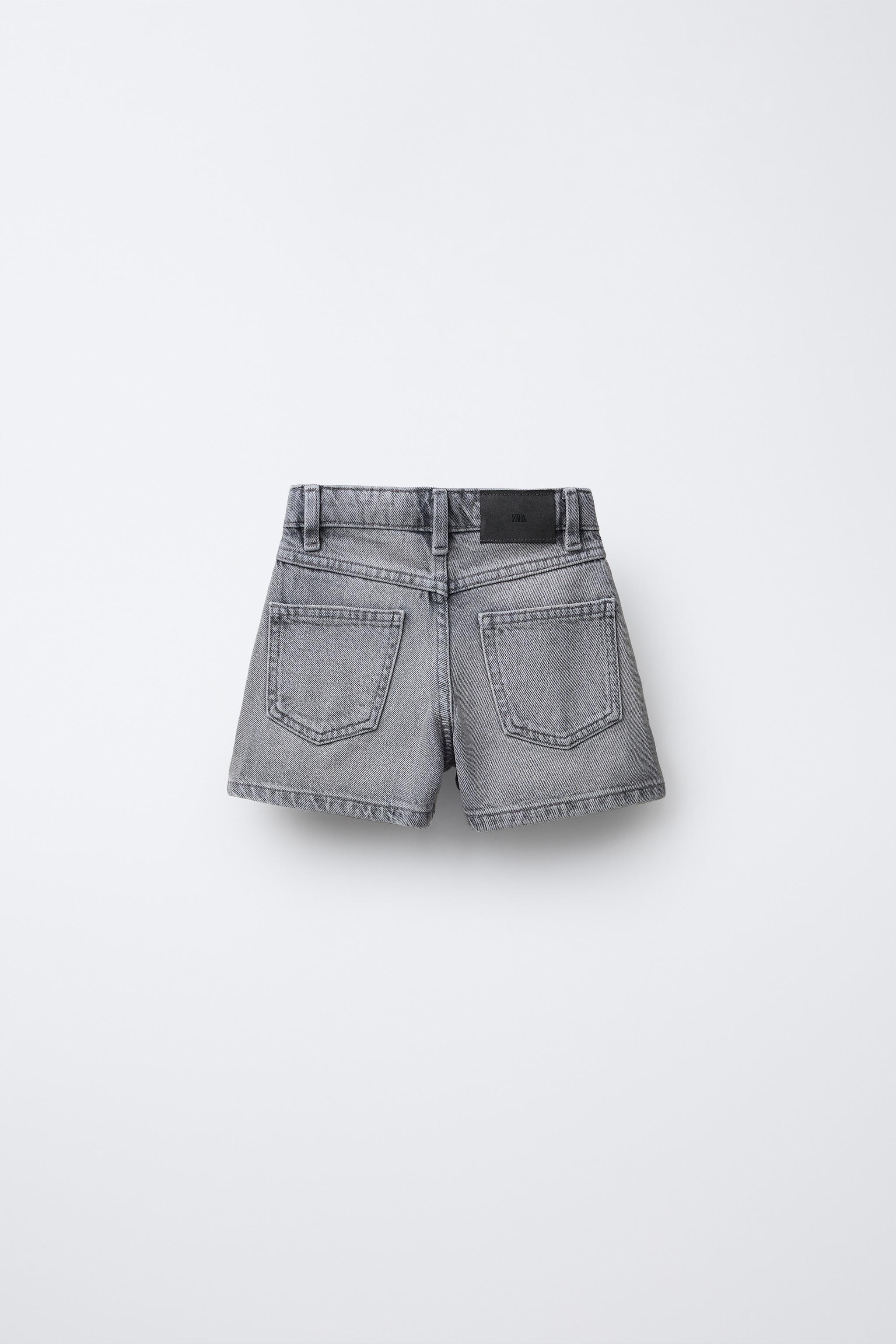 JUPE-SHORT EN JEAN AVEC CLOUS